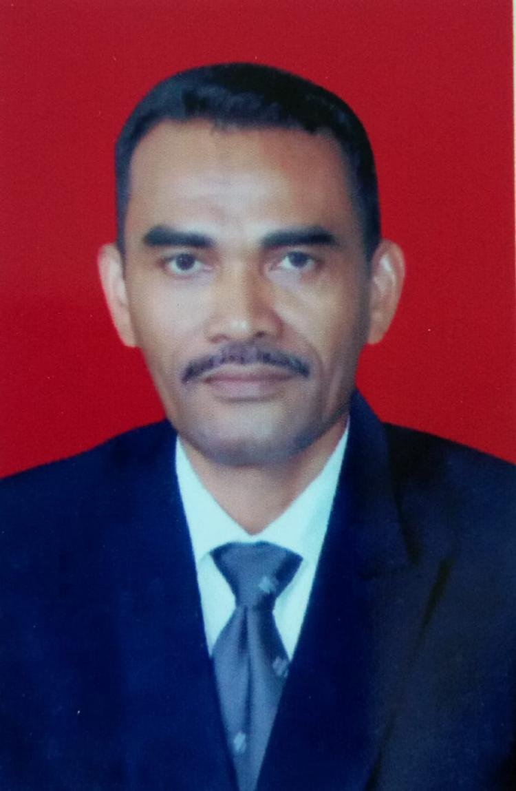 Agustinus J.E. Mawara,S.I.Kom.,M.Si